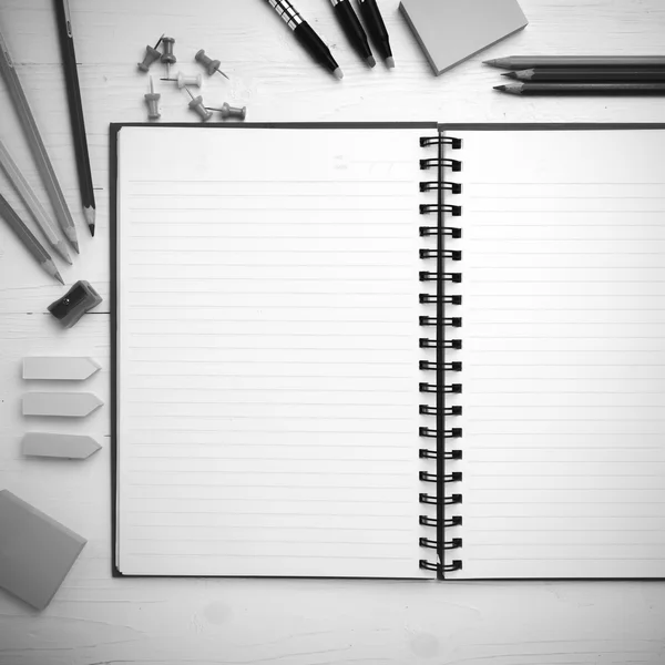 Notepad with office supplies black and white tone color style