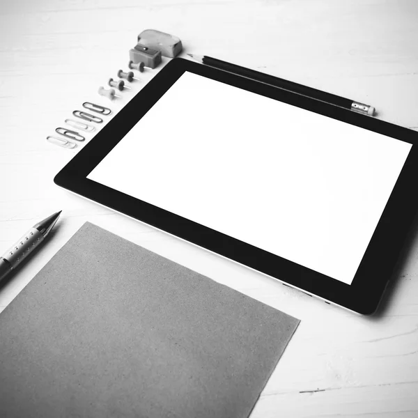 Tablet with office supplies black and white color style
