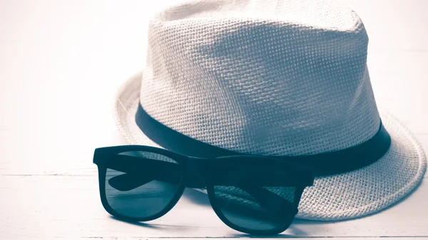 Hat and sunglasses vintage style