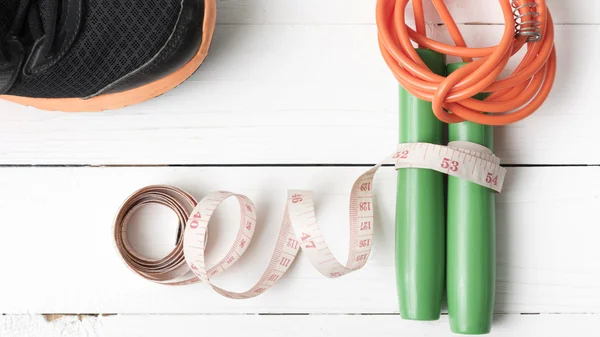 Fitness equipment on white wood table