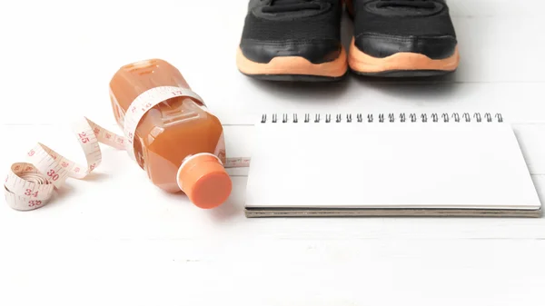 Running shoes,orange juice,measuring tape and notepad