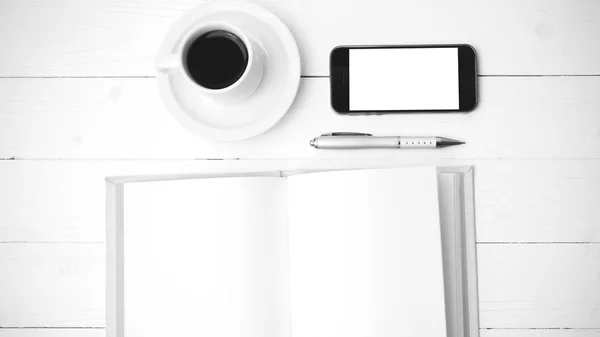 Coffee cup with phone and notebook black and white color