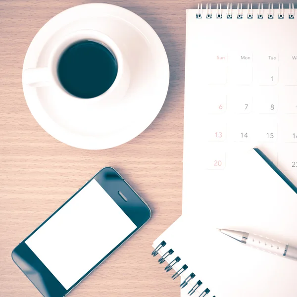 Coffee,phone,notepad and calendar