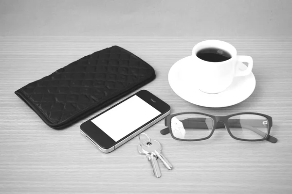 Coffee,phone,key,eyeglasses and wallet