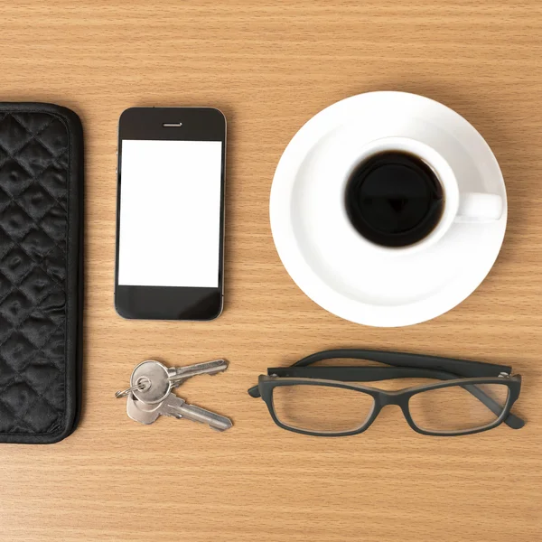 Coffee,phone,key,eyeglasses and wallet