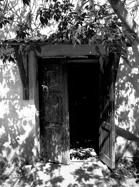 Open doors of the old house