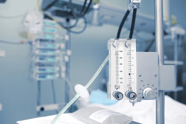 Gas medical equipment against the background of hospital bed