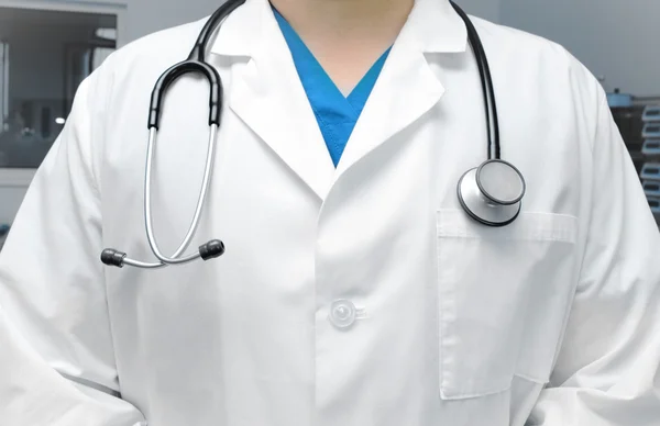 Physician man in scrubs with stethoscope