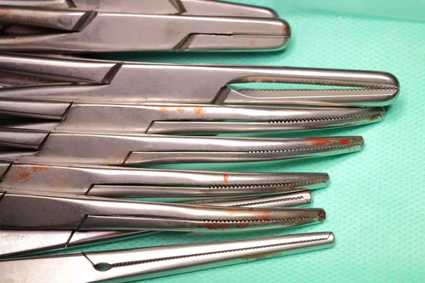 Bloody surgical tools after surgery macro