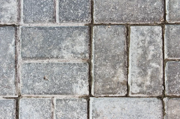 Abstract background of gray paving slabs