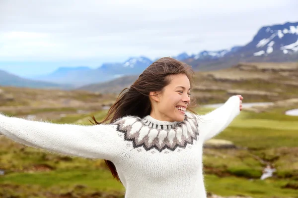 Woman wearing Icelandic sweater in Iceland