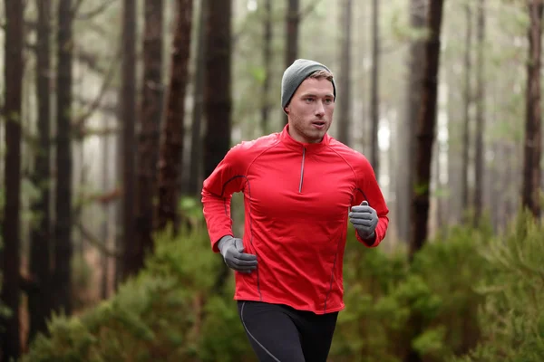 Man running in forest