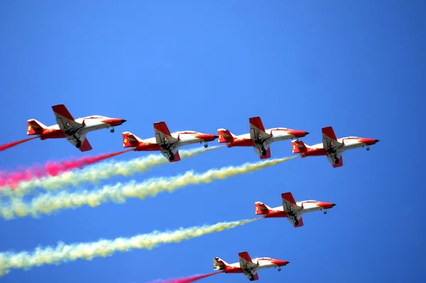 Aircraft of the Patrulla Aguila taking part in airshow flying in Alicante Volvo Ocean Race Port Village, 2014 in Alicante , Spain