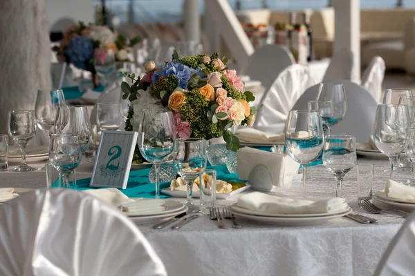 Elegance table set up for wedding in turquoise