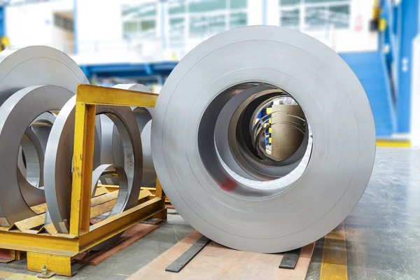 Rolls of metal sheet in factory