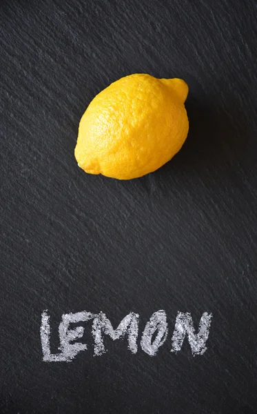 Lemon on a black slate table