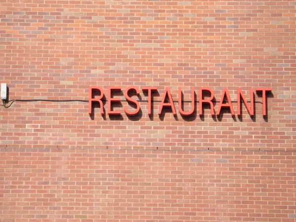 Restaurant Sign on Wall