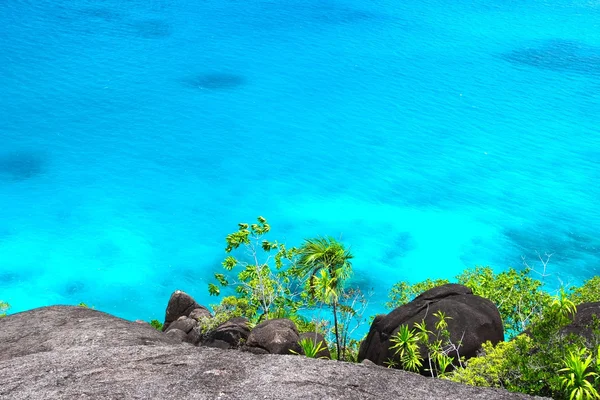Rocky landscape in the Seychelles with sea water