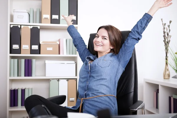 Happy Office Woman on Chair Extending her Arms