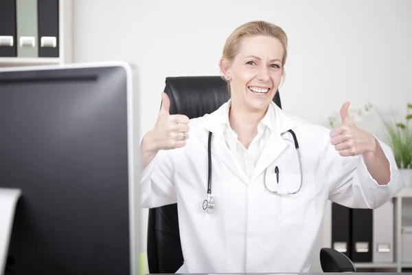 Happy Female Doctor Showing Two Thumbs Up