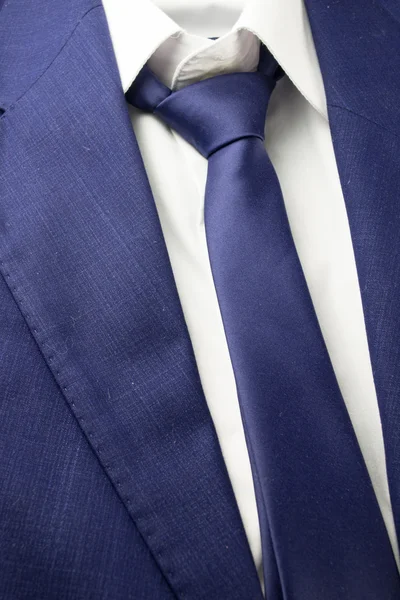 Detail view of business blue suit with tie