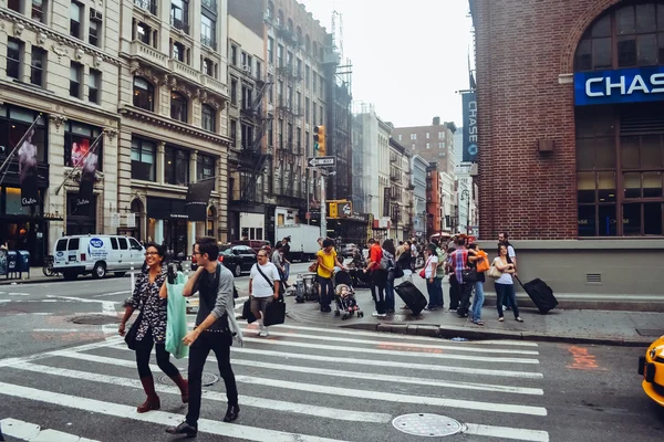 NEW YORK - CIRCA 2014: people on the streets in downtown Manhattan in New York City, NY, USA circa summer 2014.