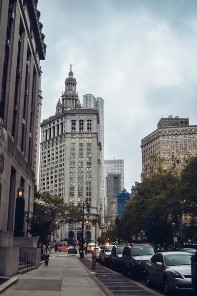 NEW YORK - CIRCA 2014: Streets and architecture in the Wall Street district in Manhattan, New York City, NY, USA circa summer 2014.