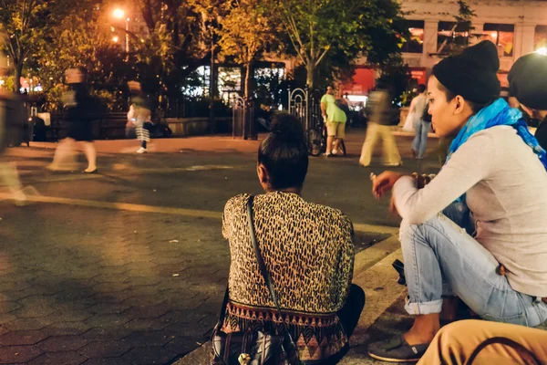 NEW YORK - CIRCA 2014: people on Union Square in the night time In New York City, NY, USA circa summer 2014.