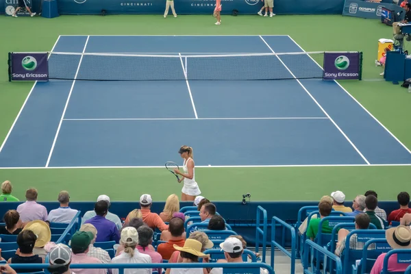 CINCINNATI, OH - CIRCA 2011: Maria Sharapova on tennis court vs Jelena Jankovic at Lindner Family Tennis Center on Western & Southern Open tournament finals in Cincinnati, OH, USA at summer 2011.