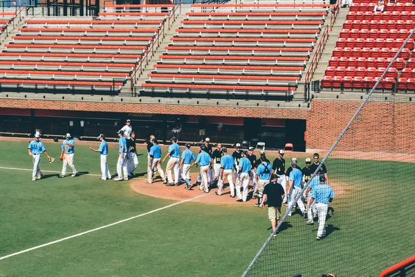 CINCINNATI, OH - CIRCA 2011: team players on a baseball training on the territory of Cincinnati University in Clifton neighborhood in Cincinnati, OH, USA at summer 2011.