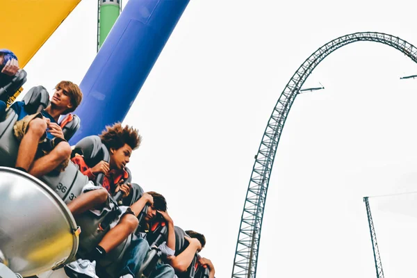 MASON, OH - CIRCA 2011: people on the ride in amusement park Kings Island in Ohio, USA at summer 2011.