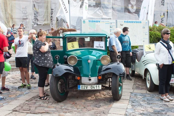 TISNOV, CZECH REPUBLIC - SEPTEMBER 3, 2016:  The traditional meeting of fans of vintage cars and motorbikes. An exhibition of old cars in the town square of Tisnov. Detail of veteran cars
