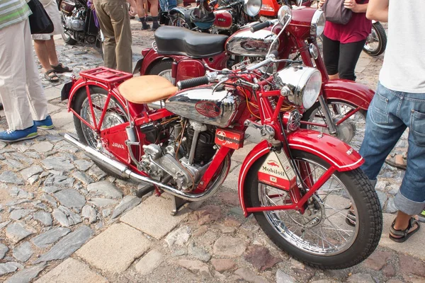 TISNOV, CZECH REPUBLIC - SEPTEMBER 3, 2013: The traditional meeting of fans of vintage cars and motorbikes. Model: JAWA 350 OHV