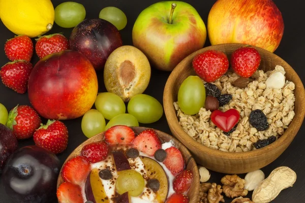 Healthy breakfast with cereals and colorful fruits. Yogurt with fruit and oatmeal. Meals for successful athletes. Food for kids.