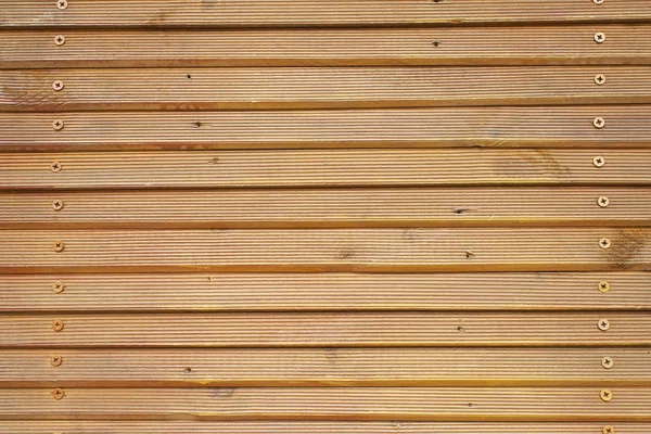 Beaded painted wood moldings, paneling outside house