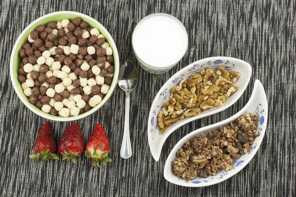 Healthy breakfast, diet meal of cereal, fruit and nuts. Processing menu