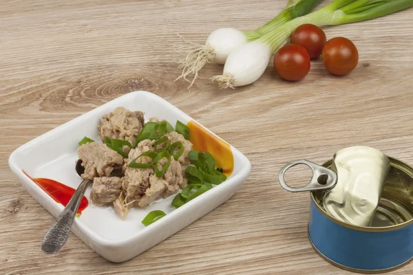 Can of tuna, a healthy meal with vegetables, fast food preparation