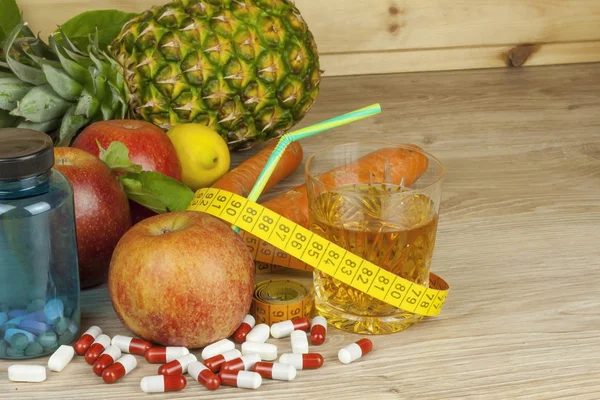 Diet food, apple juice, vegetables and fruits, concept diet, vitamin supplements, supplements