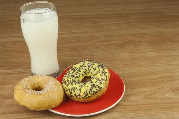 Sweet donut with coffee. Sweet treat with coffee. Donut as quick homemade treats. Junk food diets enemy. A symbol of junk food and obesity, donut for a snack.