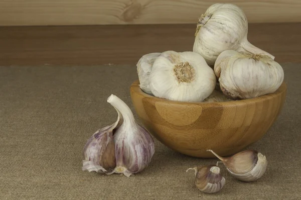 Fresh garlic. Domestic cultivation of ingredients for cooking food. Garlic as an alternative medicine against colds and flu.