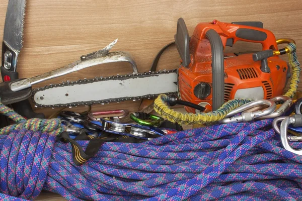 Tools for trimming trees, utility arborists. Chainsaw to work lumberjack. Arborist - doctors trees