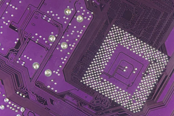 Dusty printed circuit board. High tech closeup.