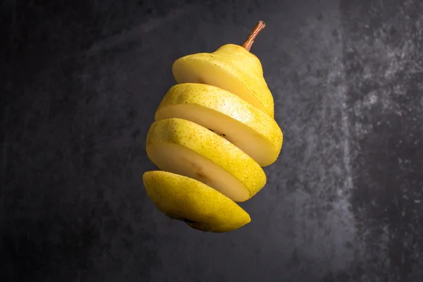 Falling slices of pear in air