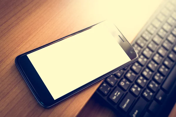Smart phone white screen is on office desk