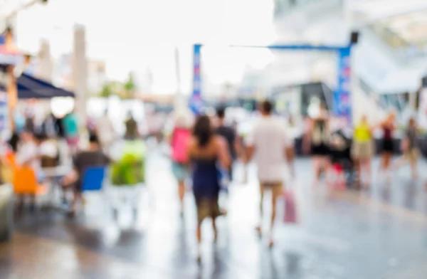 Blurred people walking in the shopping center