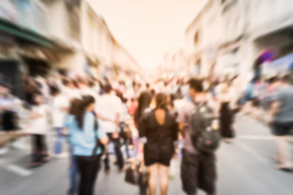 Blurred people on the street in phuket old town