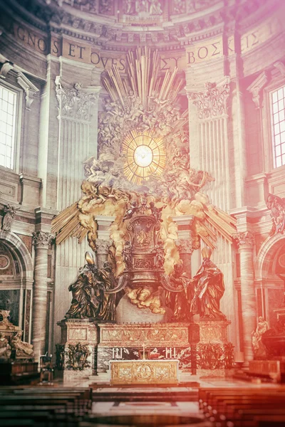 VATICAN CITY, VATICAN - OCTOBER 29: Masterpieces of Bernini; Chair of St. Peter and Gloria, the descent of the Holy Spirit in apse of basilica of St. Peter's in Rome, Italy on October 29, 2014