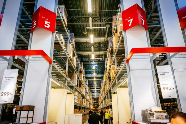 Interior of large IKEA storehouse with a wide range of products in Malmo, Sweden. Ikea was founded in Sweden in 1943, Ikea is the world\'s largest furniture retailer.