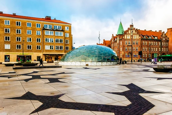 MALMO, SWEDEN - JANUARY 3, 2015: One of the town squares with glass entrance to the metro station in Malmo, Sweden.