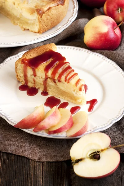 Apple pie served with red syrup